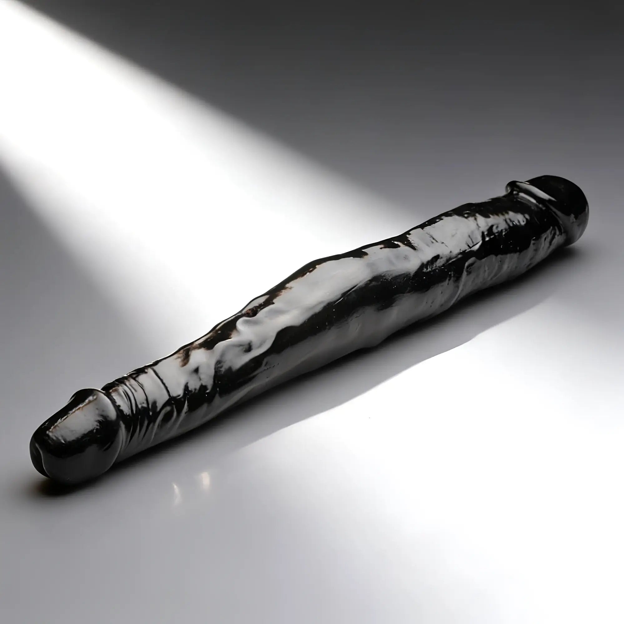 Curve Toys 13-inch tapered black double-ended dong with a realistic, textured shaft on a white studio background.