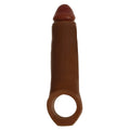 Curve Toys 2-inch brown silicone penis enhancer with a built-in ball strap, shown against a plain white background.