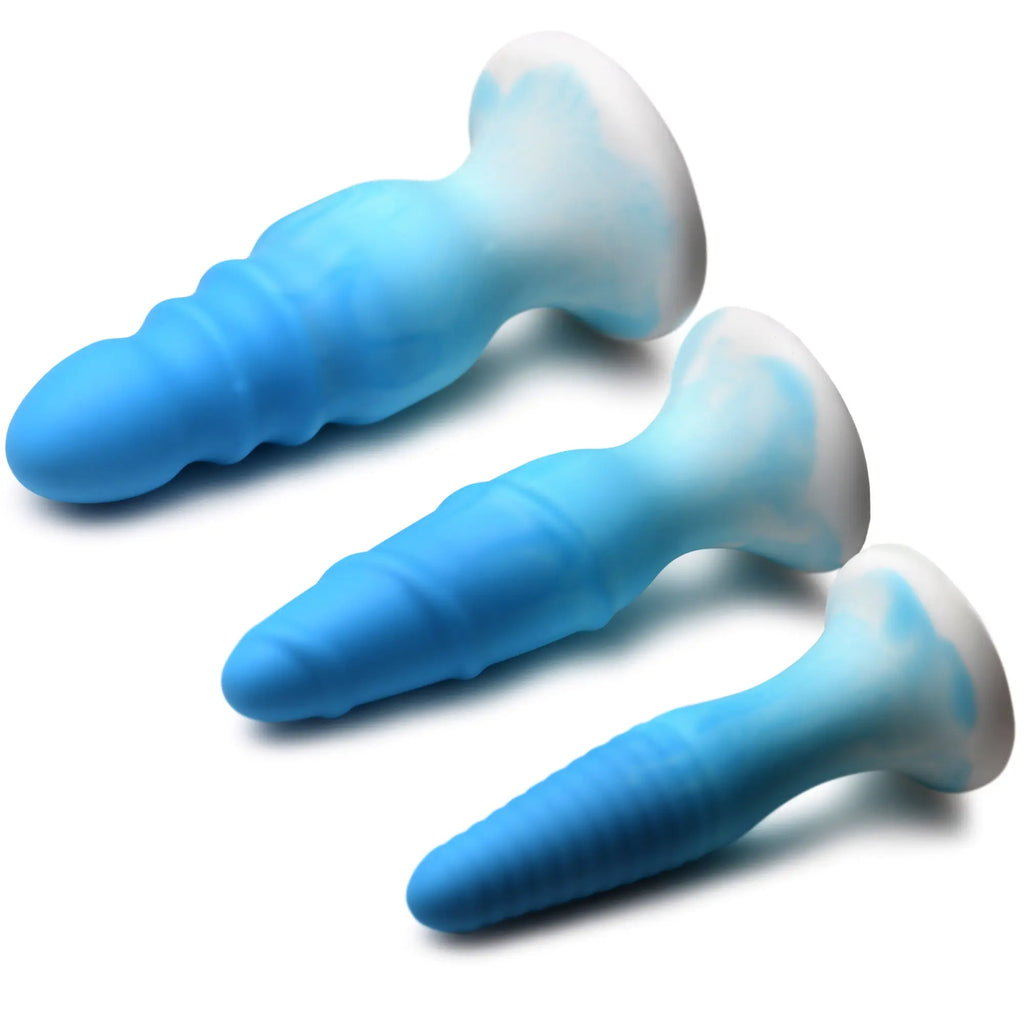 Curve Toys 3-piece silicone butt plug set in blue and white marble, featuring ribbed, tapered designs with flared bases.