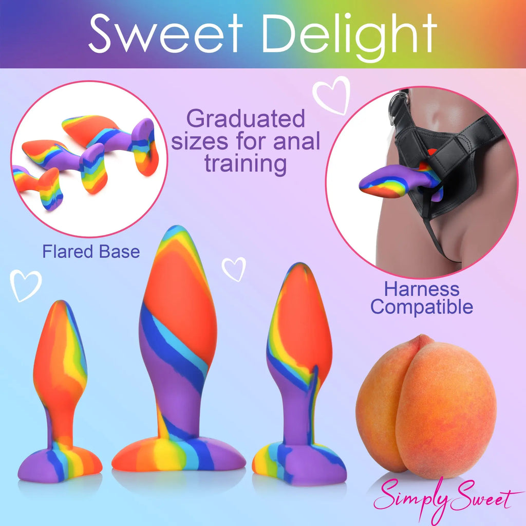 Curve Toys 3pc Rainbow Silicone Butt Plug set in graduated sizes, featuring flared bases and harness compatibility.