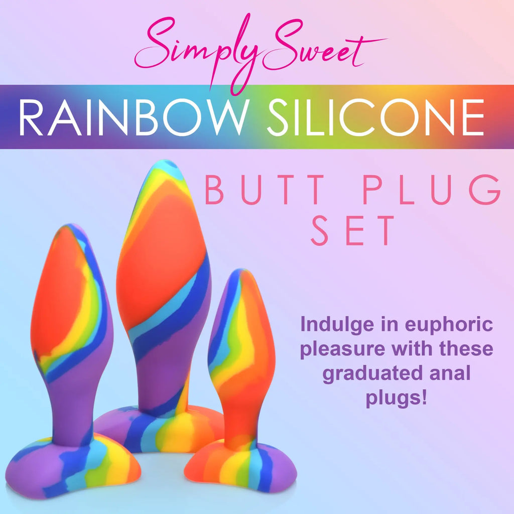 Curve Toys 3pc rainbow silicone butt plug set featuring three graduated plugs in a colorful, marbled swirl design.
