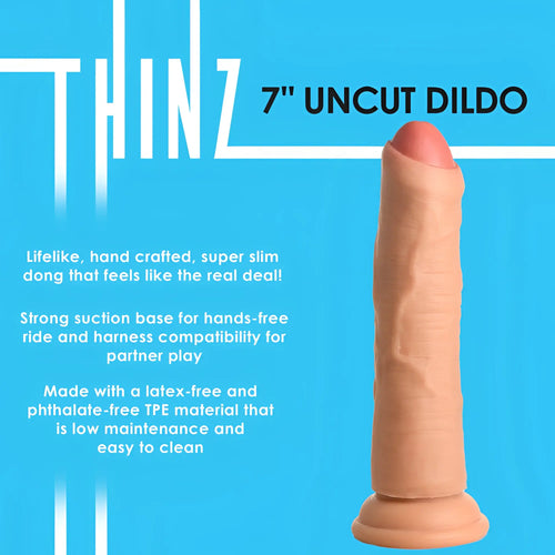Curve Toys 7" Uncut Dildo: A realistic, slim, skin-toned textured dildo with a suction cup base on a blue background.