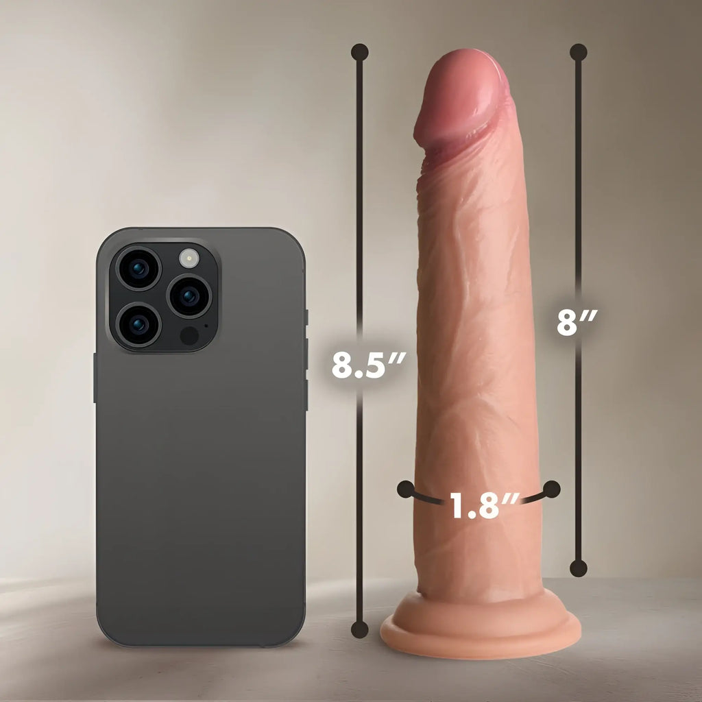 Curve Toys 8.5-inch realistic skin-tone silicone dildo shown next to a smartphone for size reference.