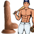 Curve Toys Baseball Brian 7-inch tan, realistic textured dildo with suction cup base next to a cartoon baseball player.