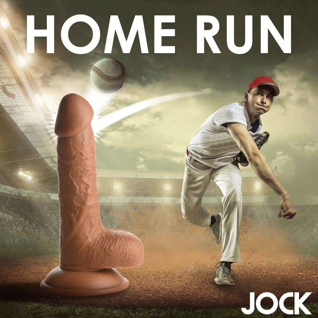 Curve Toys Baseball Brian 7-inch flesh-toned realistic dildo on a stadium field with a baseball player and ball.