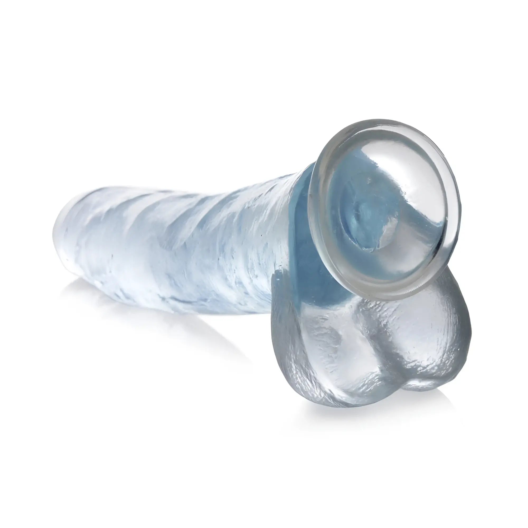 Curve Toys Clear C-Thru dildo in translucent light blue with realistic balls and a suction cup base on white background.