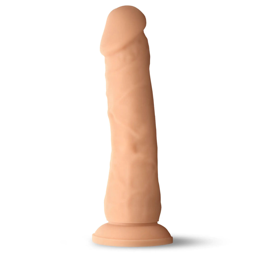 Curve Toys Easy Riders 7-inch flesh-toned silicone dildo with realistic texture and a flat suction-cup base.