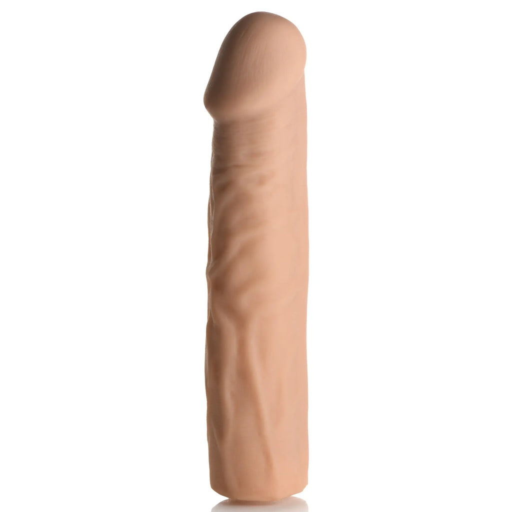 Curve Toys 3-inch flesh-colored penis extension with realistic skin texture, standing vertically against a white background.