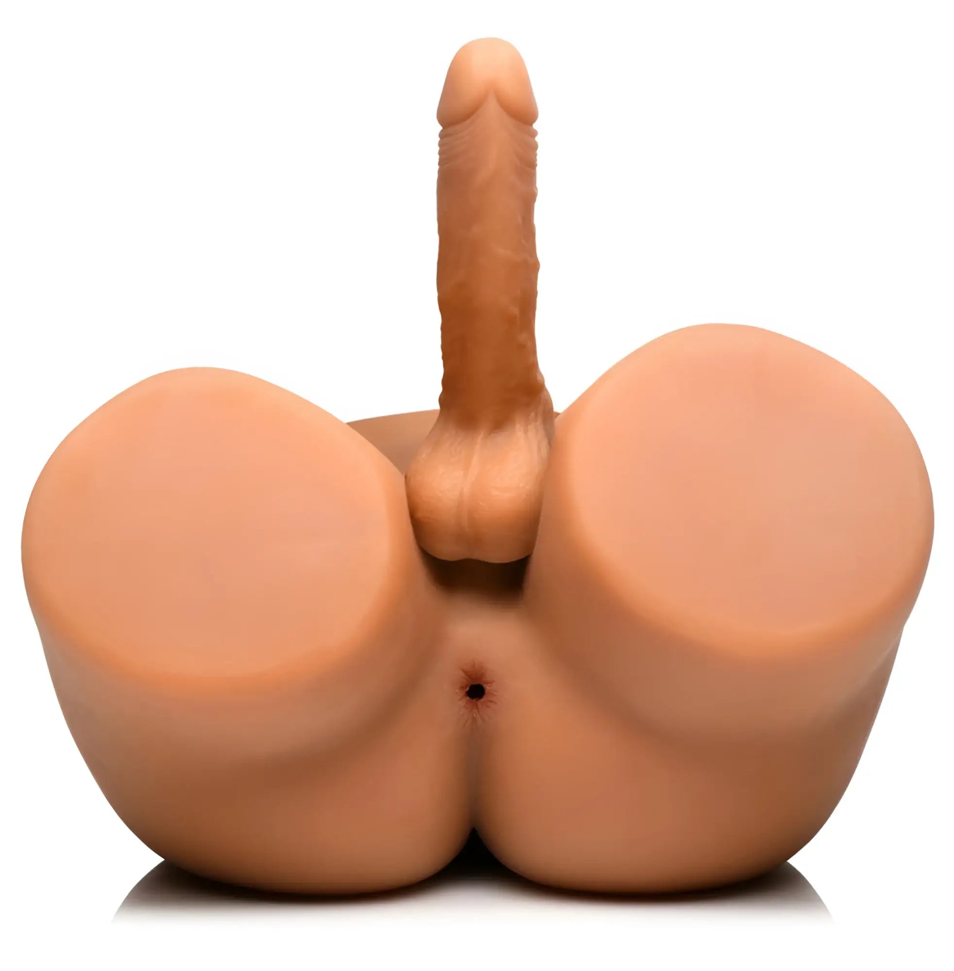 Curve Toys JOCK male masturbator: a tan, realistic silicone base with a thrusting phallic attachment.