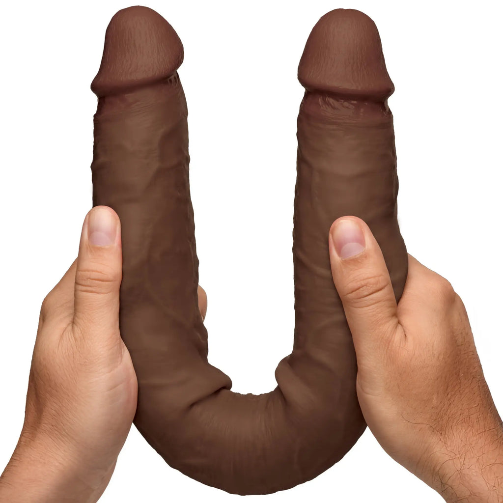 Curve Toys JOCK Real Skin 17.75" double dildo in dark brown, held by two hands against a white background.