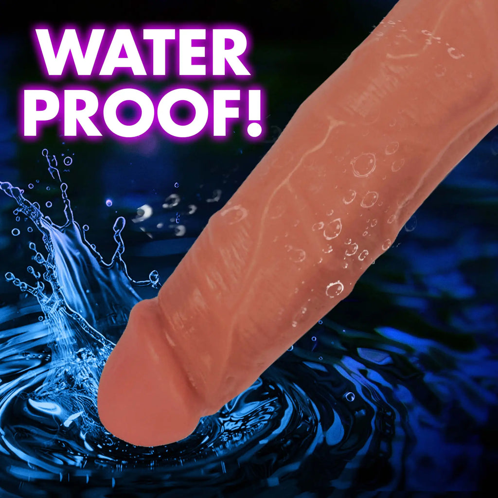 Curve Toys Light Bareskin vibrating dildo in tan, with realistic texture, dipping into dark blue rippling water.