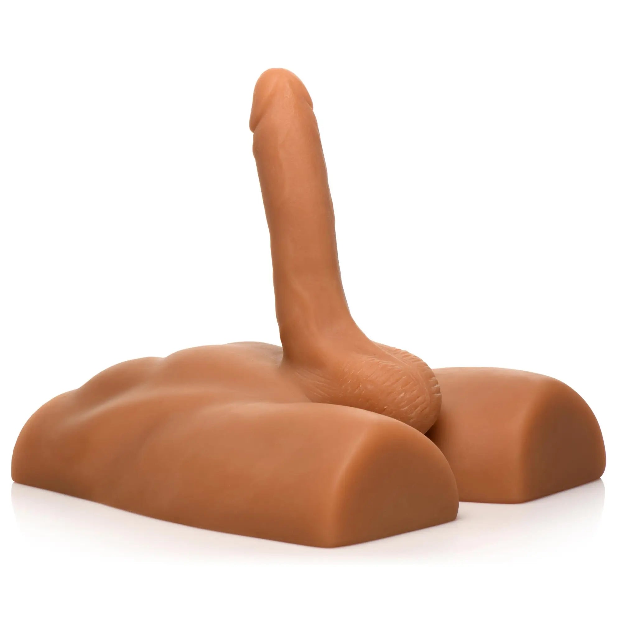 Curve Toys tan silicone male ass masturbator featuring a realistic, posable vertical dildo on a contoured base.