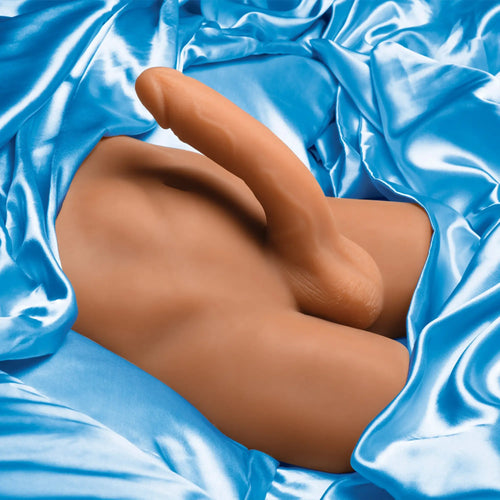 Curve Toys male ass masturbator with a posable dildo, featuring realistic tan silicone skin on blue satin fabric.