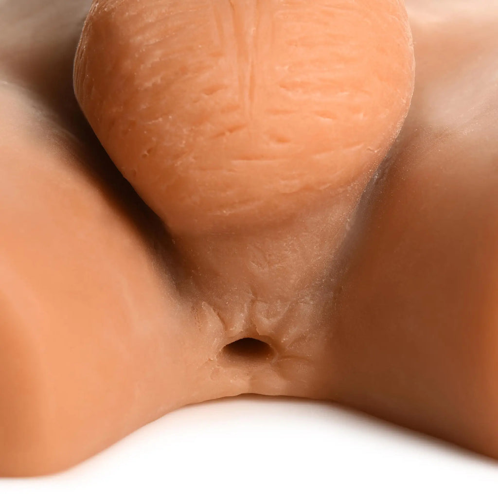 Curve Toys Male Ass Masturbator with posable dildo: a realistic, skin-toned textured silicone anal opening and mound.