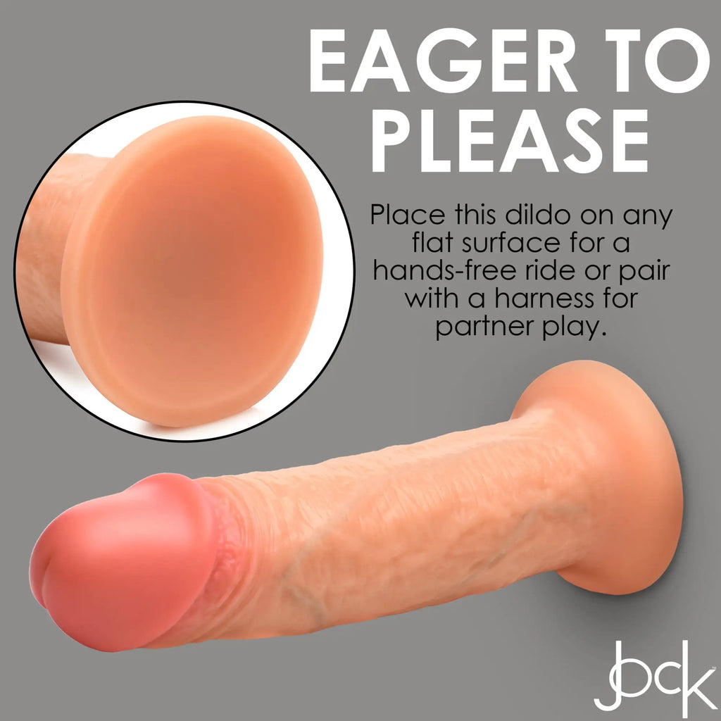 Curve Toys Real Skin Silicone Dildo: A realistic, peach-toned dildo featuring a suction cup base for hands-free play.