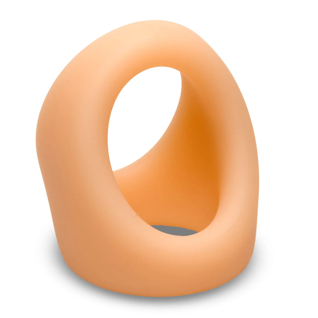 Curve Toys silicone cock and ball ring in a smooth, peach-colored, asymmetrical loop design.