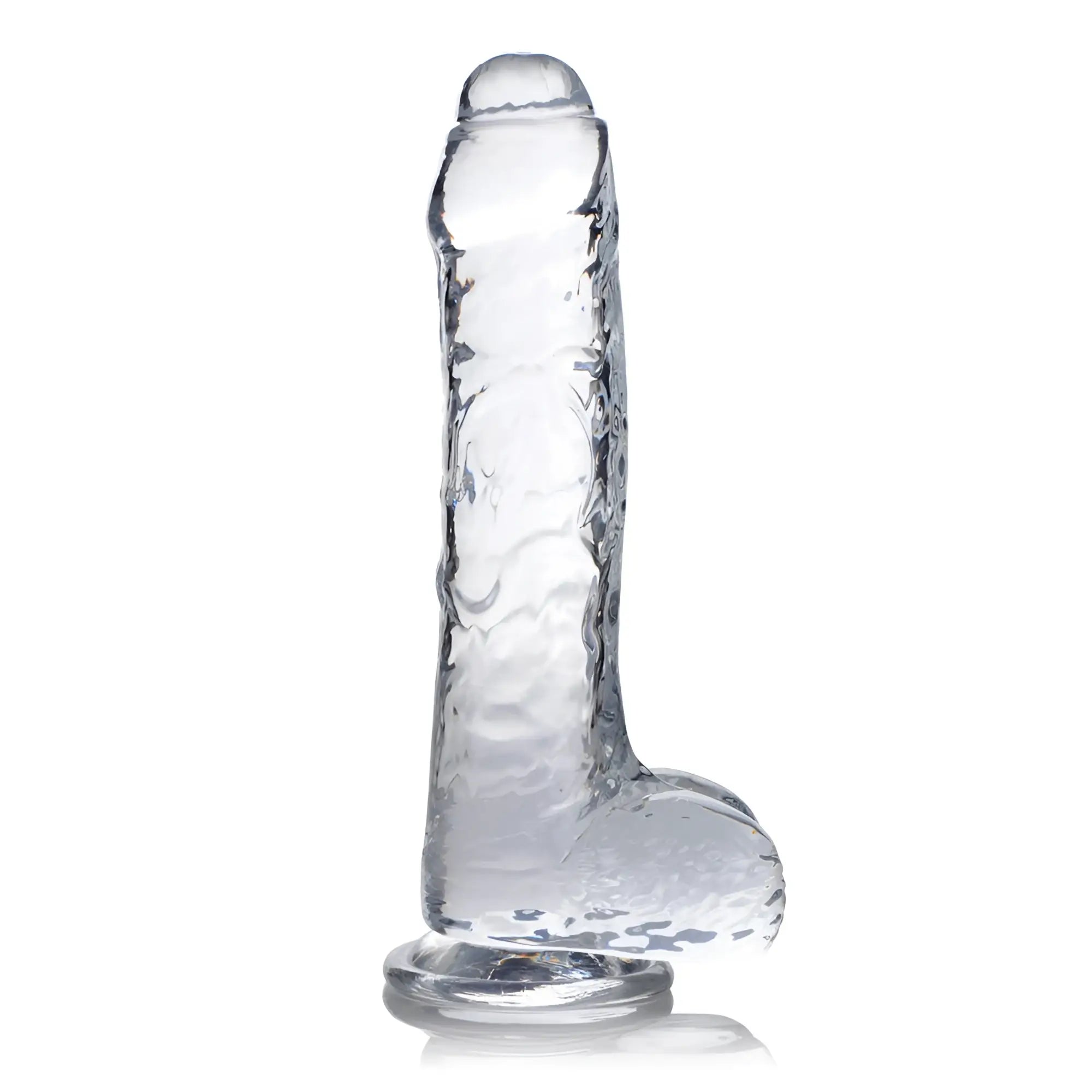 Curve Toys Slim C-Thru clear dildo with balls, featuring a realistic textured design and a flat base on white.