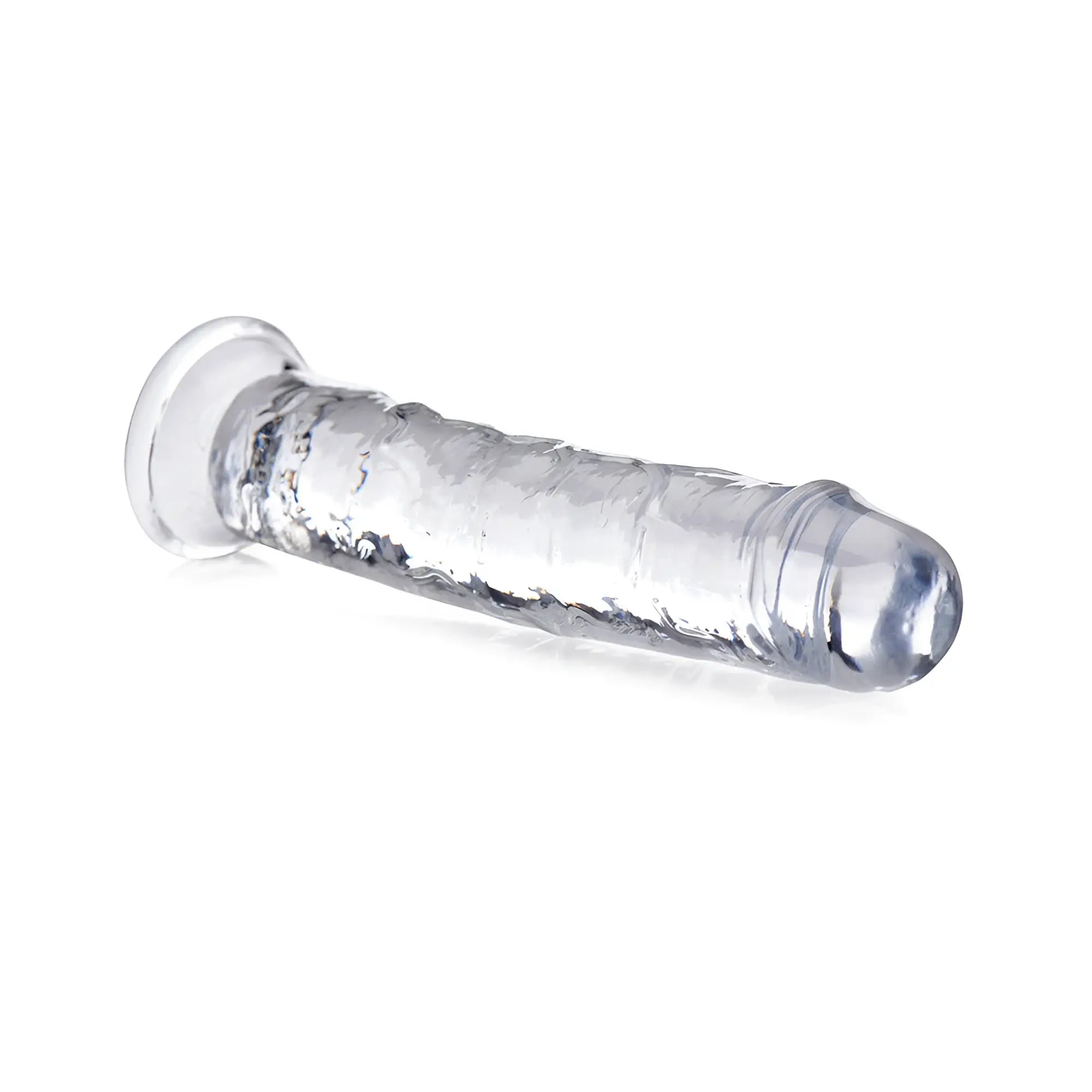 Curve Toys Slim C-Thru clear dildo with a textured shaft and flared base, isolated on a white background.