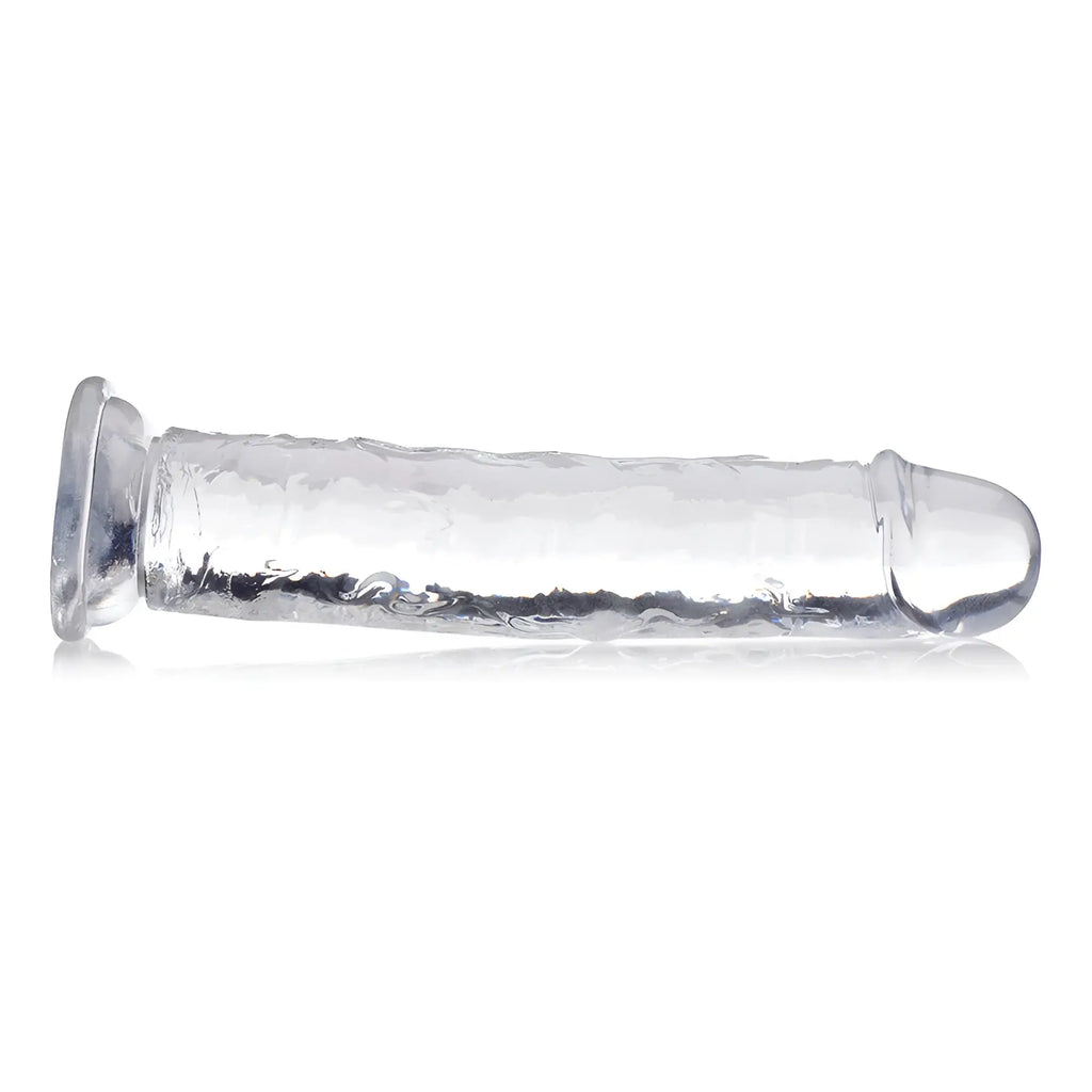 Curve Toys Slim C-Thru clear dildo with a realistic, textured shaft and flared base, displayed on a white background.