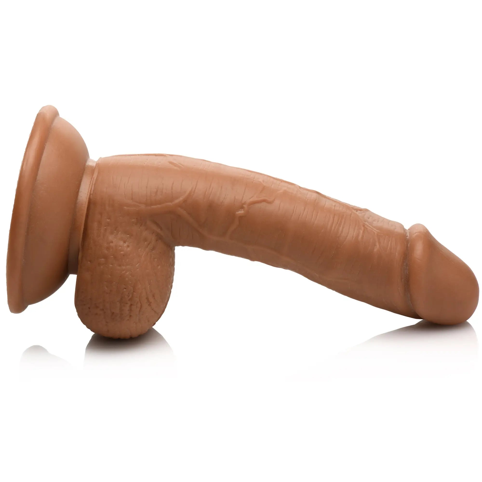 Curve Toys Soccer Sam 7-inch tan, realistic dildo with textured detail and a suction cup base, shown from the side.