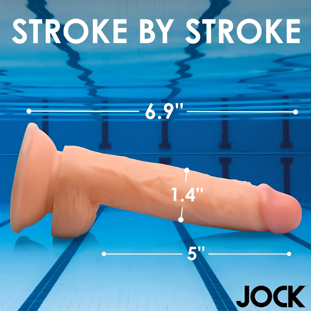 Curve Toys Swimming Simon, a realistic skin-toned dildo with suction base, overlaid with size dimensions against a pool.
