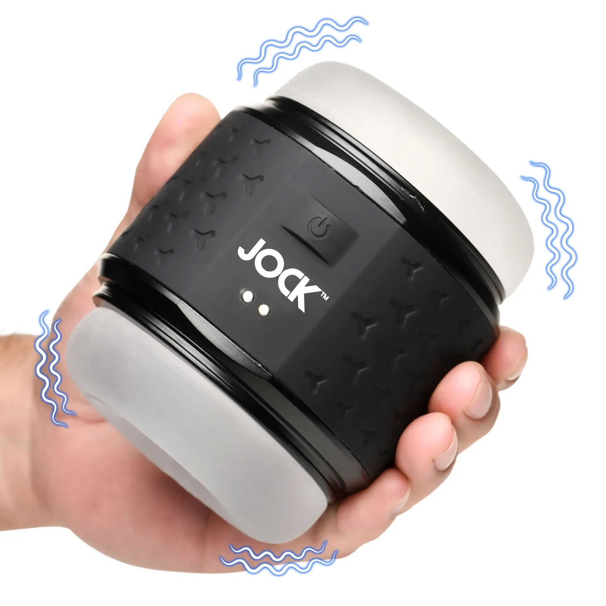 A hand holds a black and grey JOCK vibrating double stroker with blue vibration graphic lines against a white background.