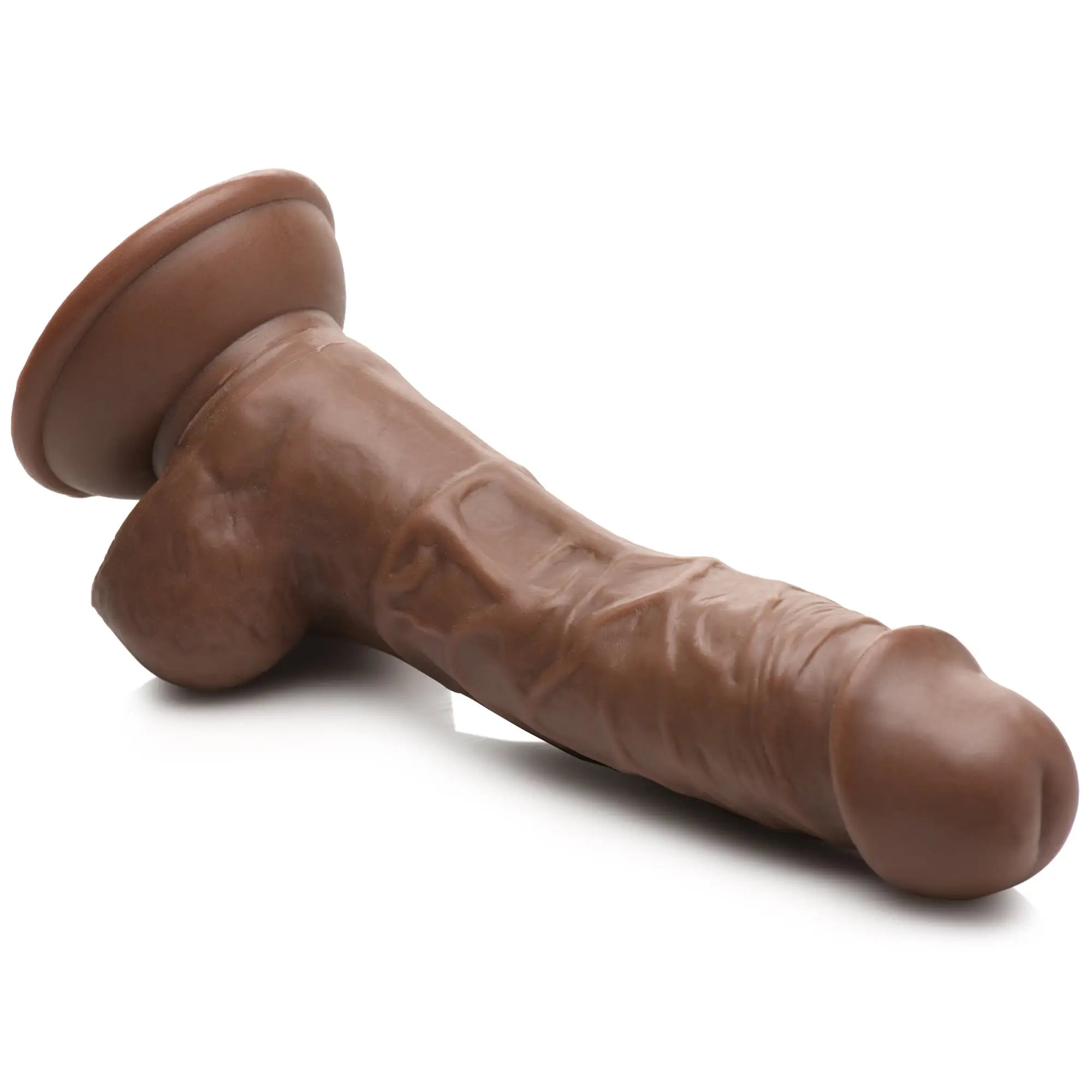 Curve Toys Weightlifting Wesley 7-inch dildo in chocolate brown with a realistic texture and a suction cup base.