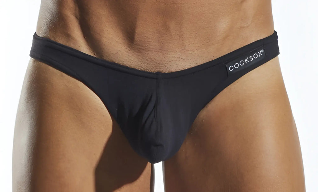 Black cocksox cx01 brief men’s thong in black with sleek form-fitting design and subtle logo on waistband front view