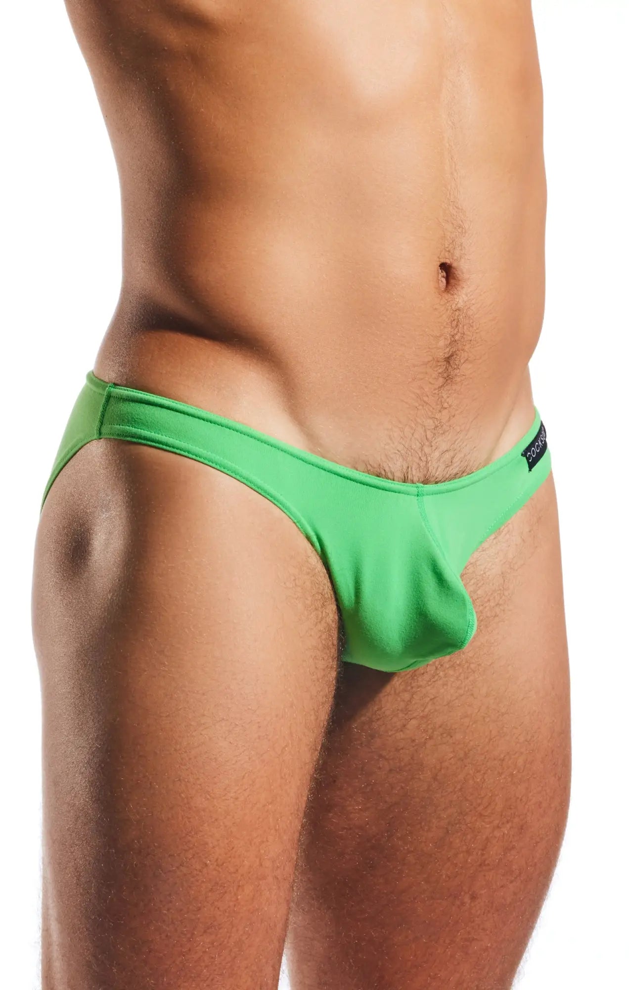Bright green cx01 brief swim trunks with elastic waistband and distinctive cut for a form-fitting look