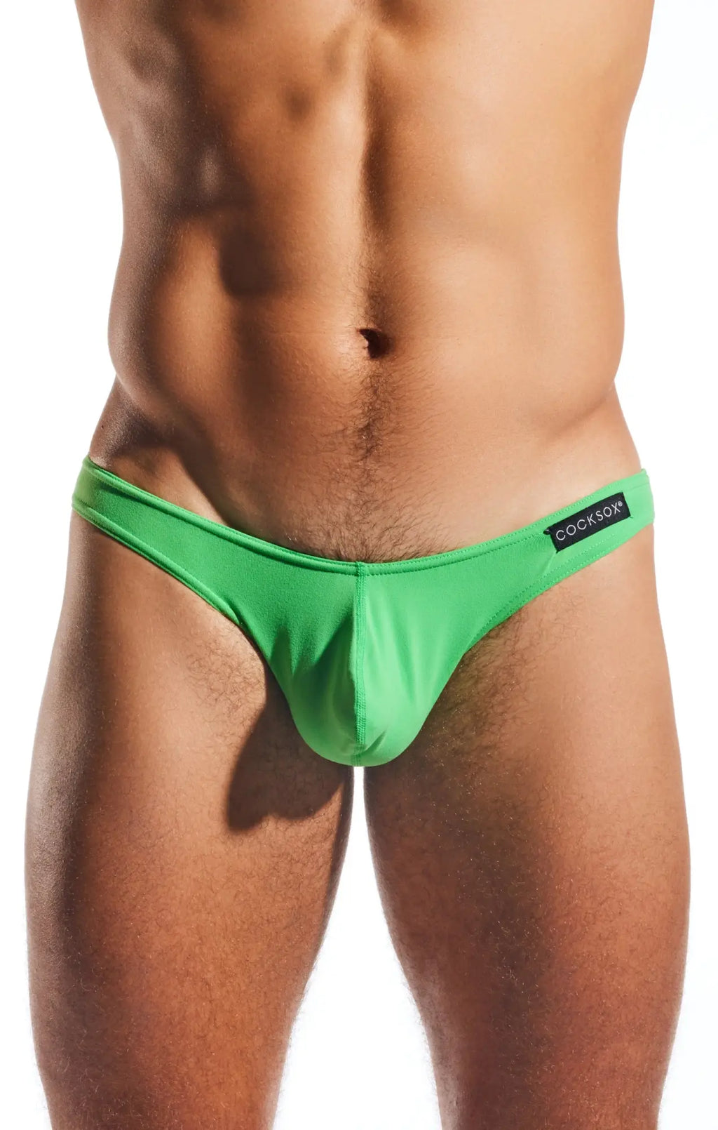 Bright green form-fitting thong brief with black cocksox brand label on waistband called cx01 brief