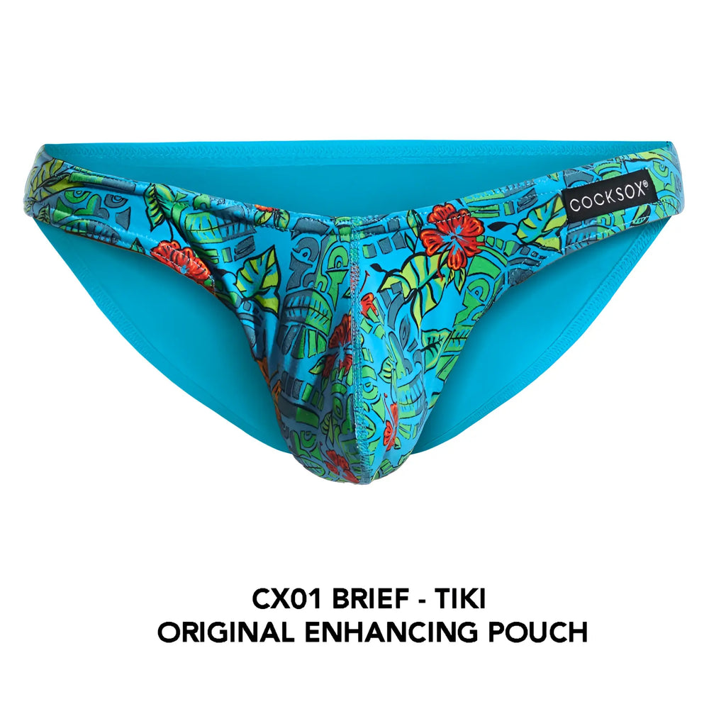 Cx01 brief in bright turquoise with a vibrant tropical tiki pattern of green leaves red flowers and blue yellow faces