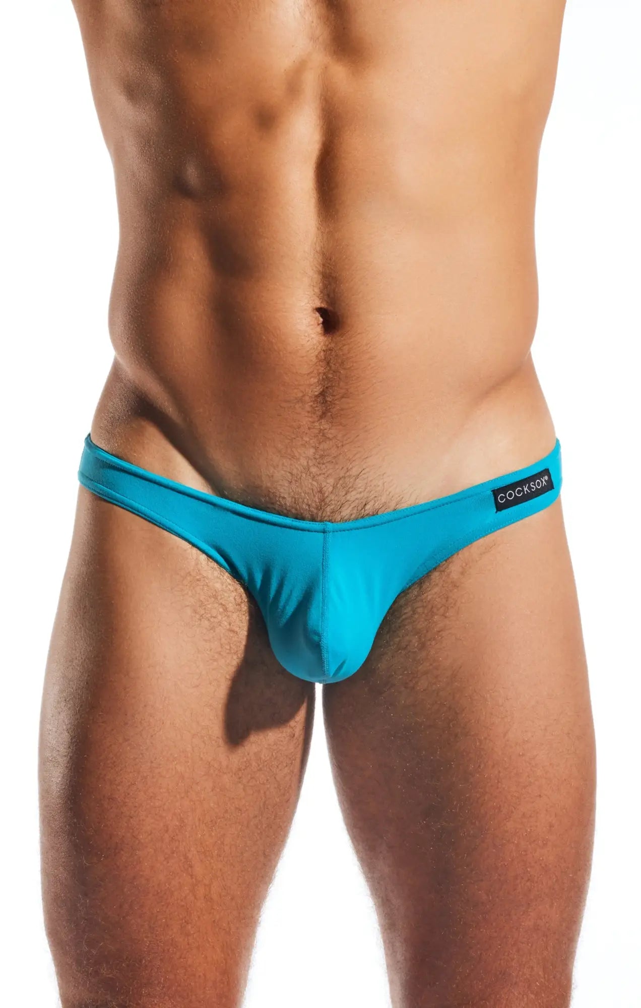 Turquoise cockson brand cx01 brief thong made of stretchy fabric with sleek form fitting design shown from the back
