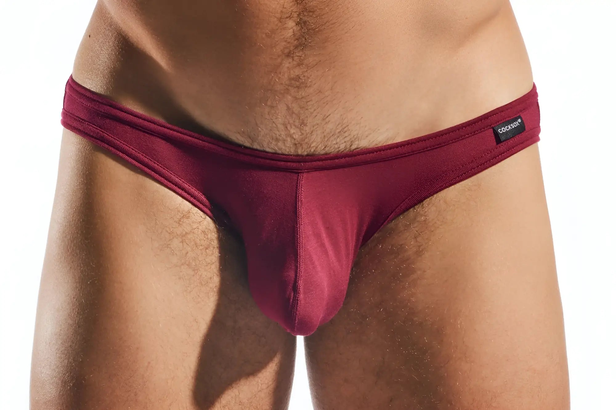 Maroon cx01md brief with sleek smooth fabric form fitting design and black brand tag on the waistband