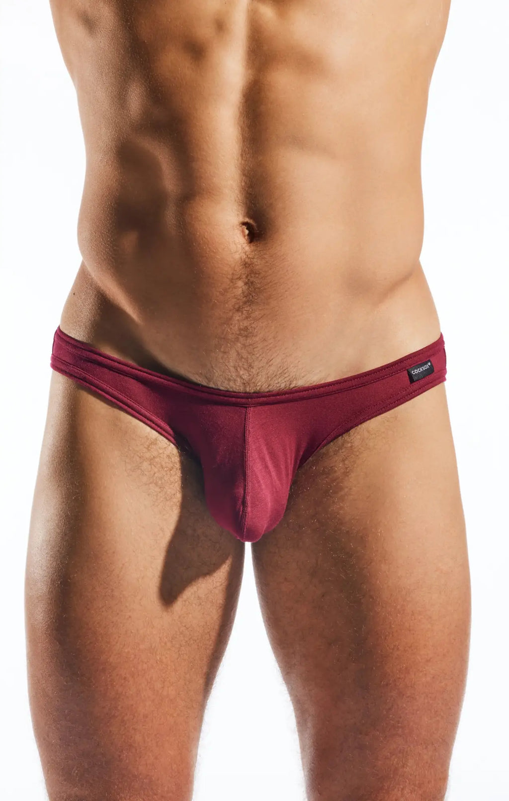 Maroon cx01md brief men’s form-fitting underwear with smooth fabric and small black brand tag on waistband