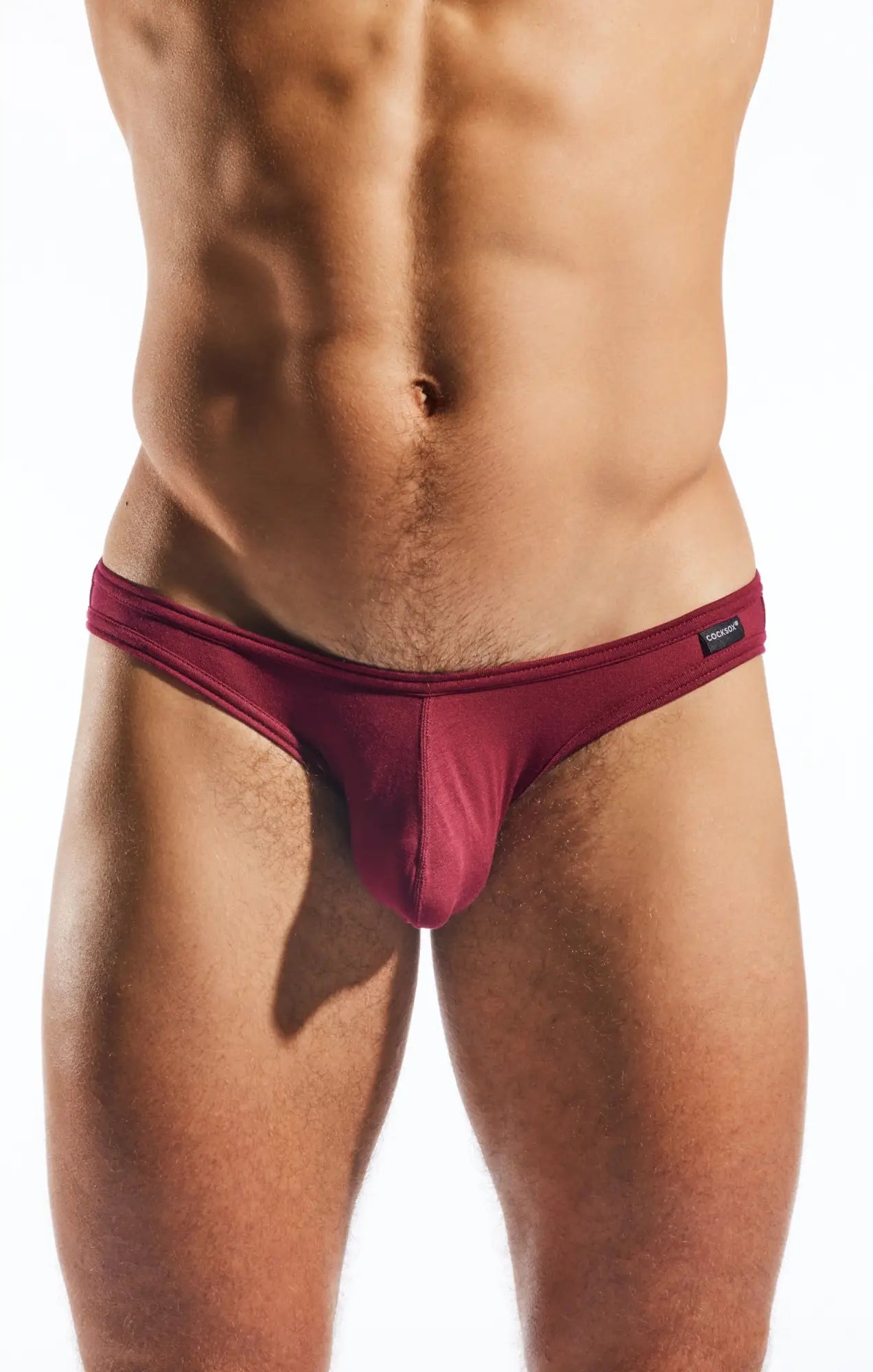 Maroon cx01md brief men’s form-fitting underwear with smooth fabric and small black brand tag on waistband