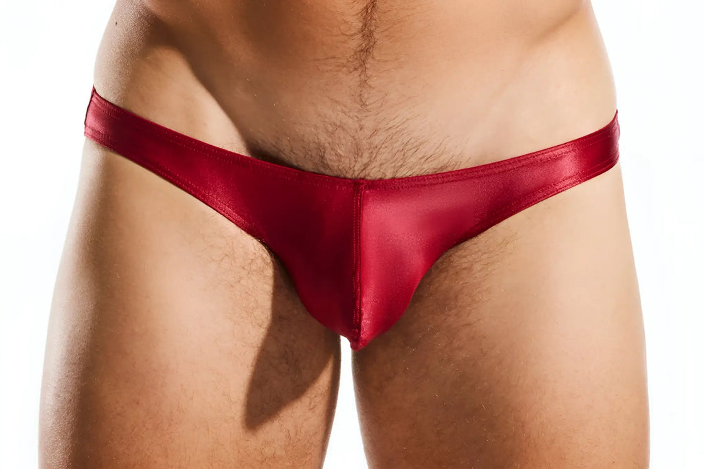 Red satin thong swim brief cx02gs showing the front design with sleek smooth fabric and vibrant color