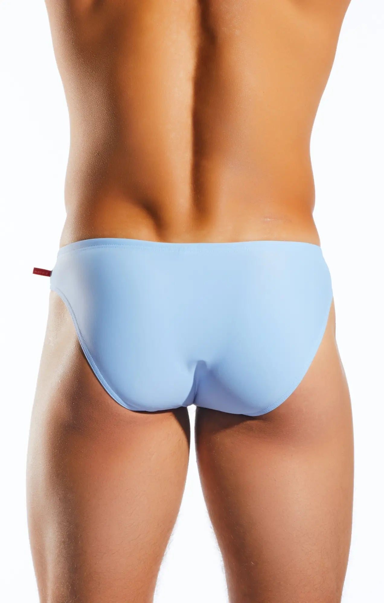 Cx04 drawstring swim brief in light blue with smooth texture and a small red tab on the side for swimming use