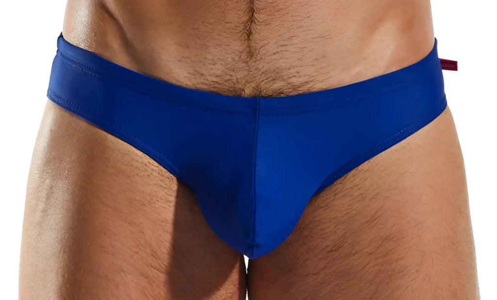 Royal blue cx04 drawstring swim brief with snug fit and small red tag on the waistband