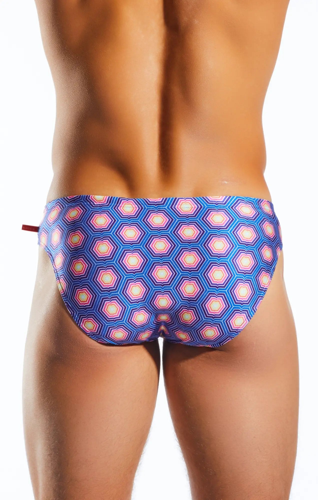 Blue and pink geometric-patterned swim trunks with hexagonal design cx04pr drawstring swim brief front view