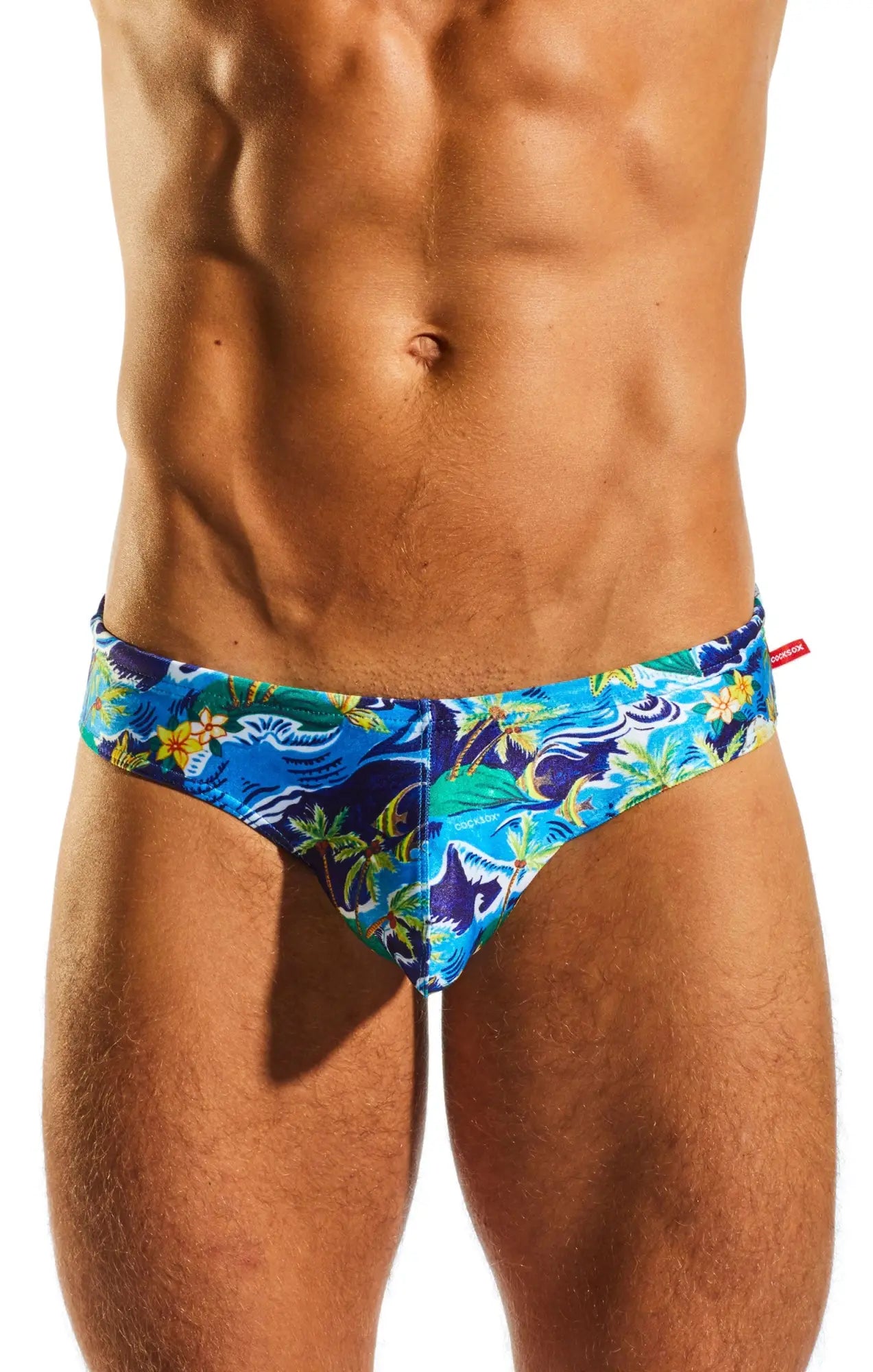 Cx04pr drawstring swim brief in vibrant blue and green tropical print with shark motif for beach and pool use
