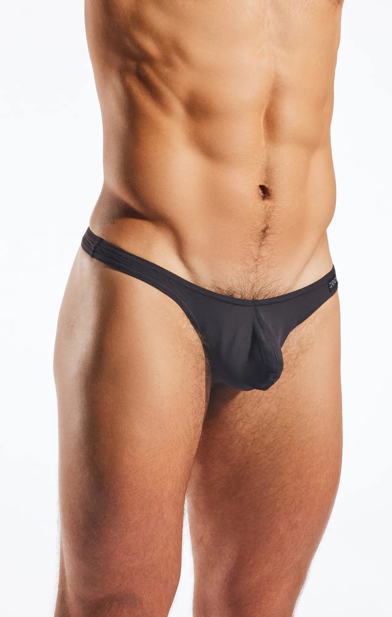 Black cx05 thong for men with a sleek, form-fitting design and smooth fabric finish shown from the back side