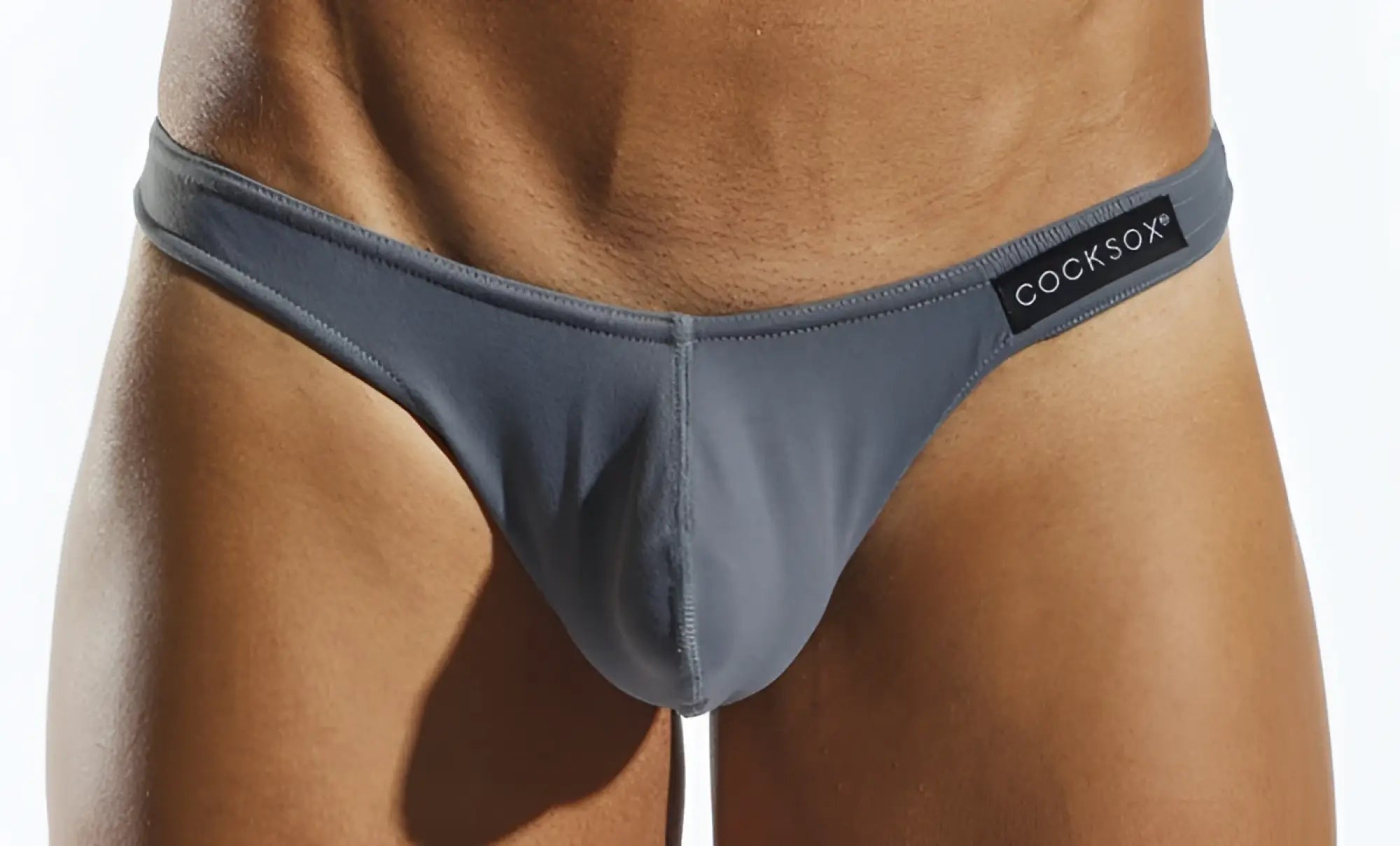 Gray cooksox thong cx05 with a sleek minimalist design and subtle stitching details shown from the back side