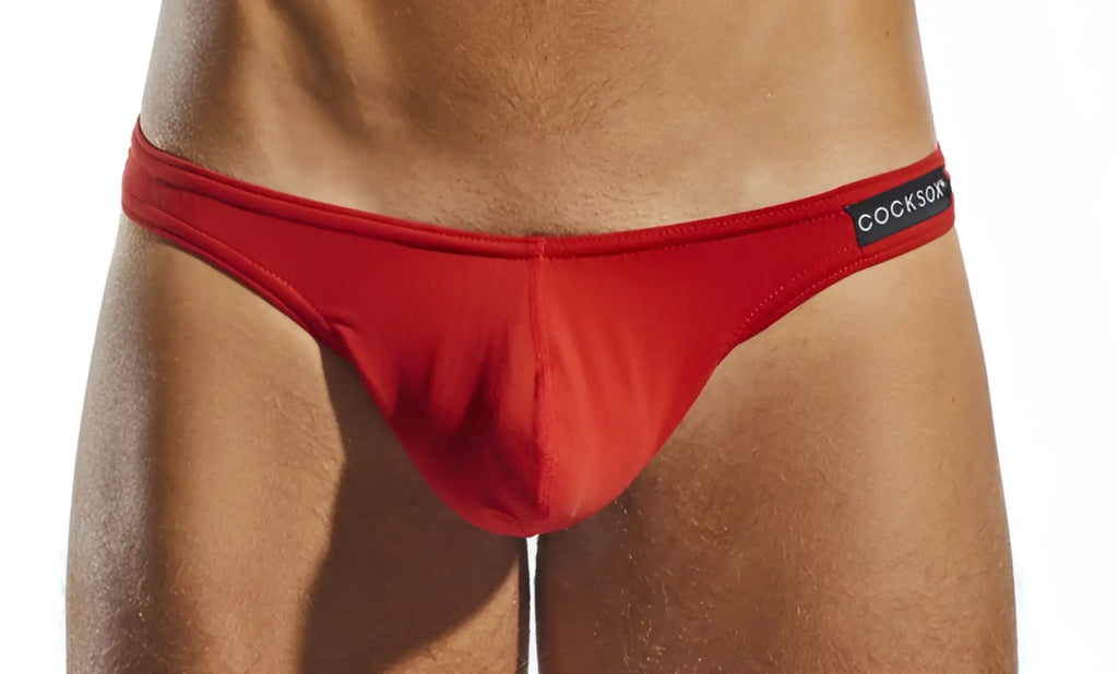 Red cockson cx05 thong briefs with smooth form-fitting fabric and black waistband label shown from the back side