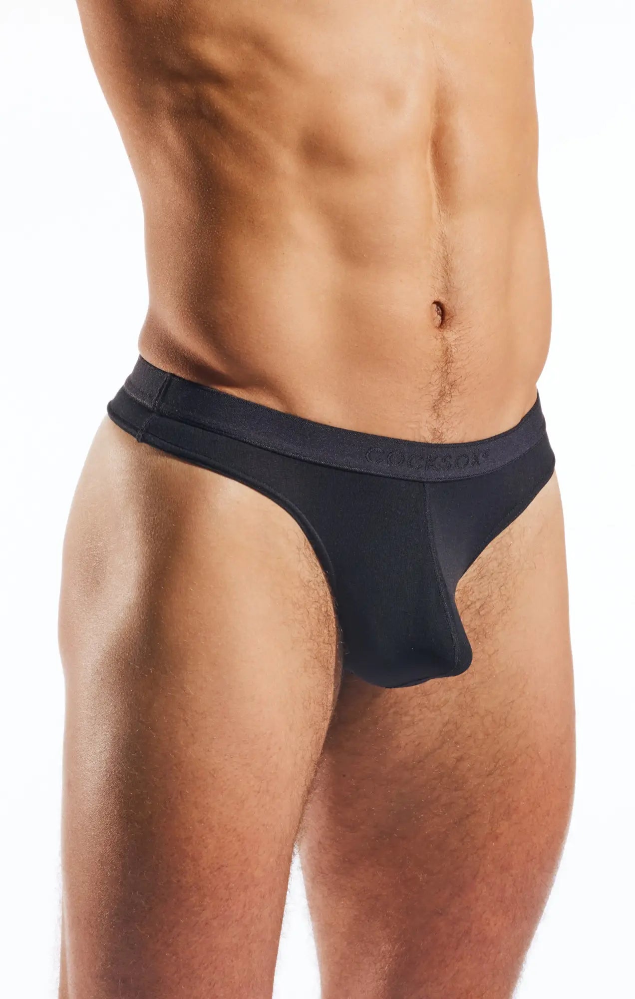 Black mens CX05MD thong with smooth form fitting fabric and subtle brand logo on the waistband shown from the back