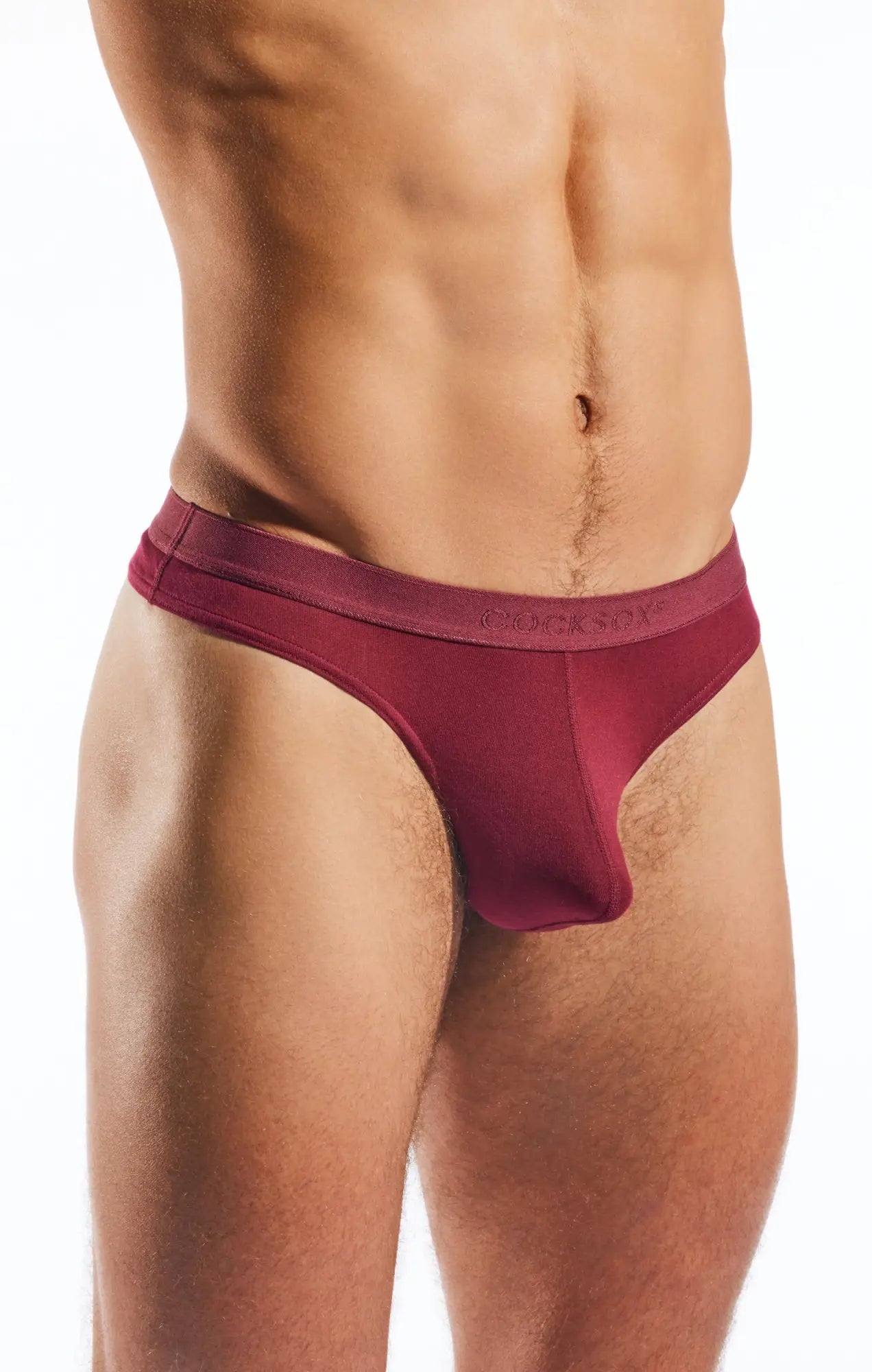 Maroon duckson brand cx05md thong made of smooth stretchy fabric with contoured design shown from the back