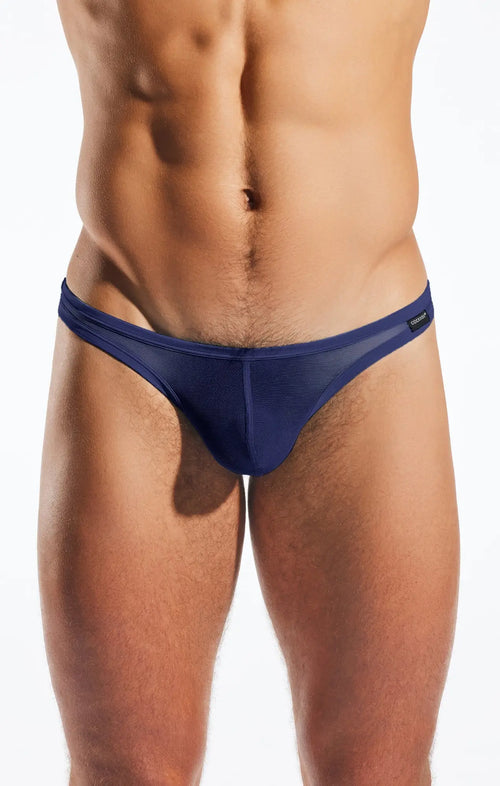 Navy blue cx05me mesh thong with a sleek form-fitting design made from breathable mesh fabric