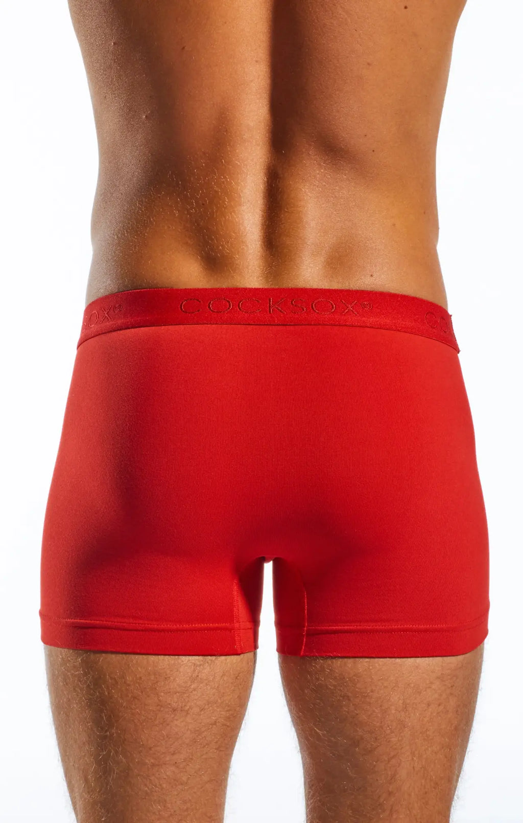 Red men’s CX12 boxer briefs with matching elastic waistband featuring subtle gray cocksocks brand lettering