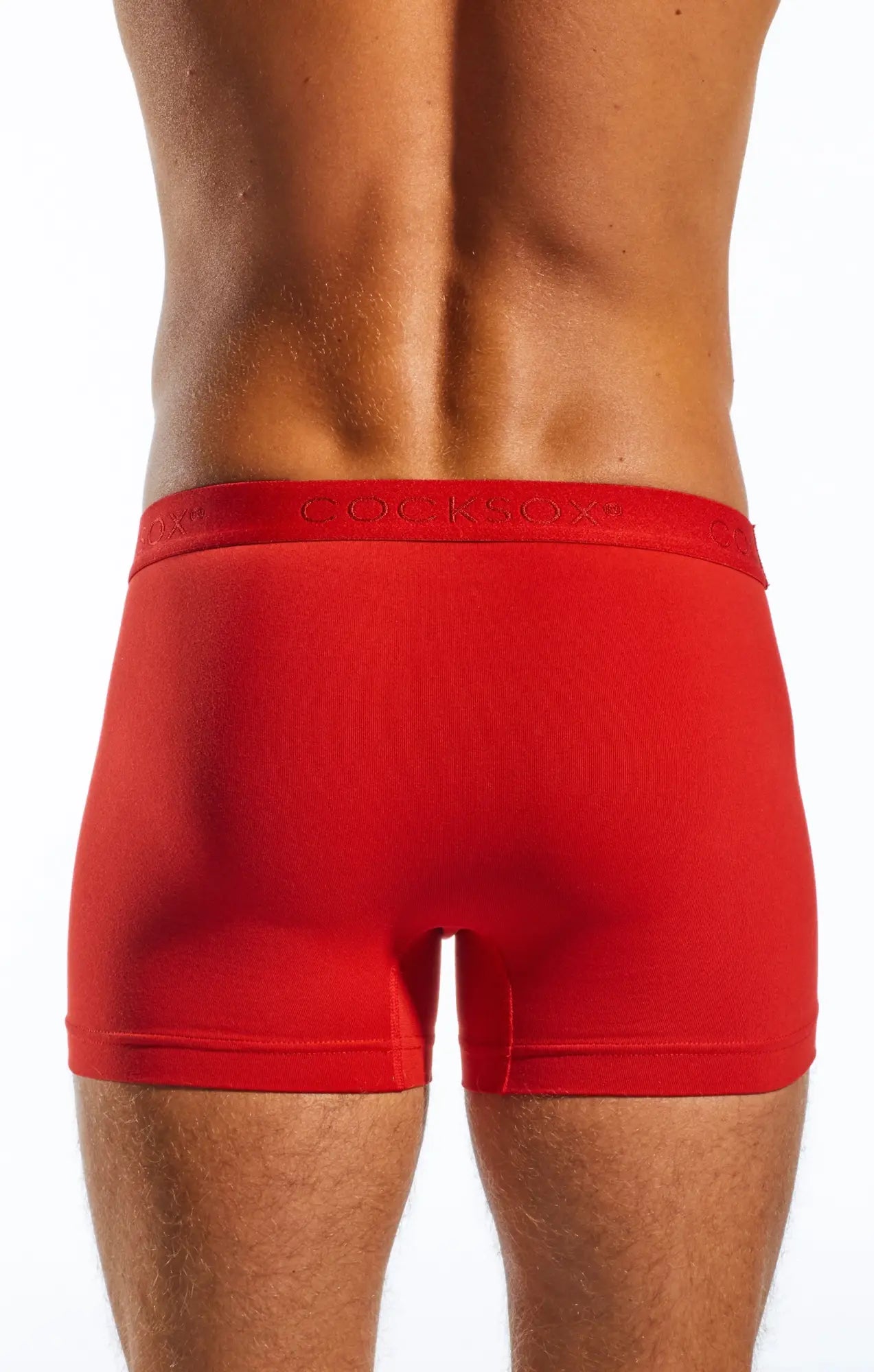 Red men’s CX12 boxer briefs with matching elastic waistband featuring subtle gray cocksocks brand lettering