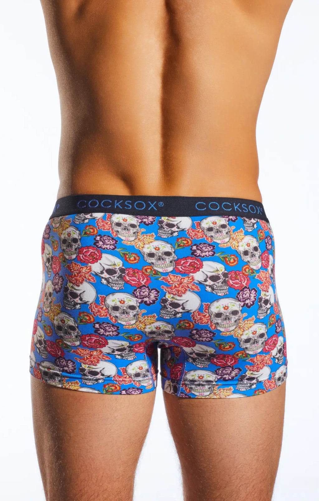 Blue cocksox cx12dd boxer briefs with vibrant white skulls and colorful roses pattern on blue fabric
