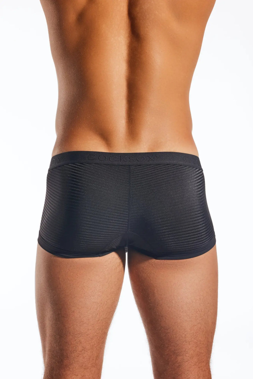 Black textured briefs with subtle ribbed pattern and branded waistband from the CX68LUX Semi-Sheer Trunk collection
